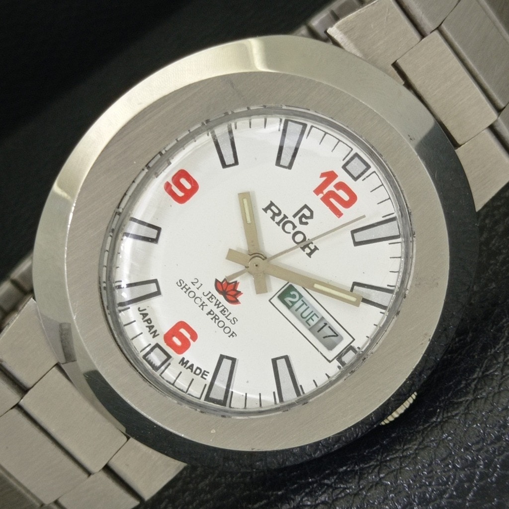 Vintage 1972 Ricoh Automatic Mens Silver Watch WDaydate  Red Accents